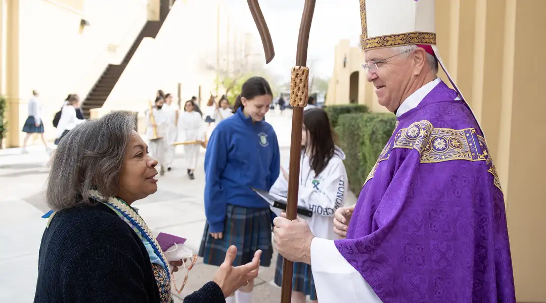 Bishop visiting Xavier