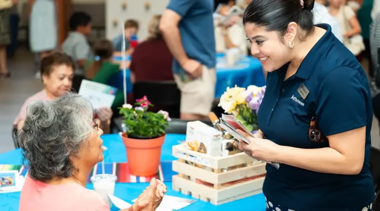 elderly talking to a care taker